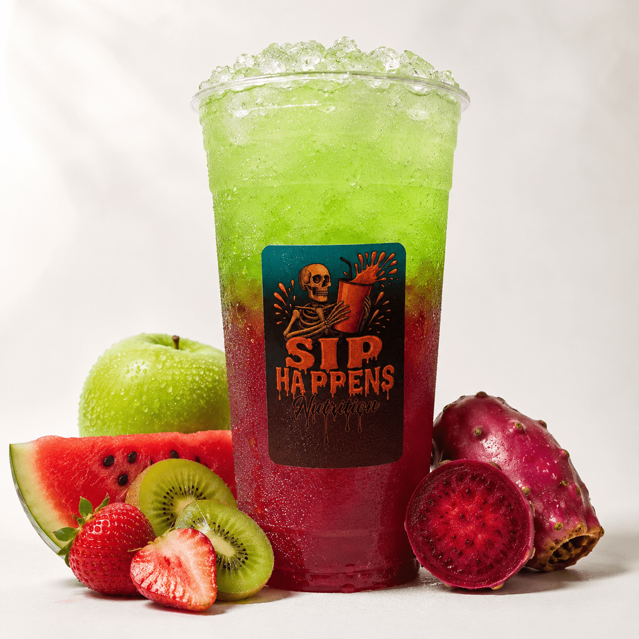 Sip Happens Nutrition iced drink with red-to-green layered colors, surrounded by watermelon, strawberry, kiwi, green apple, and prickly pear