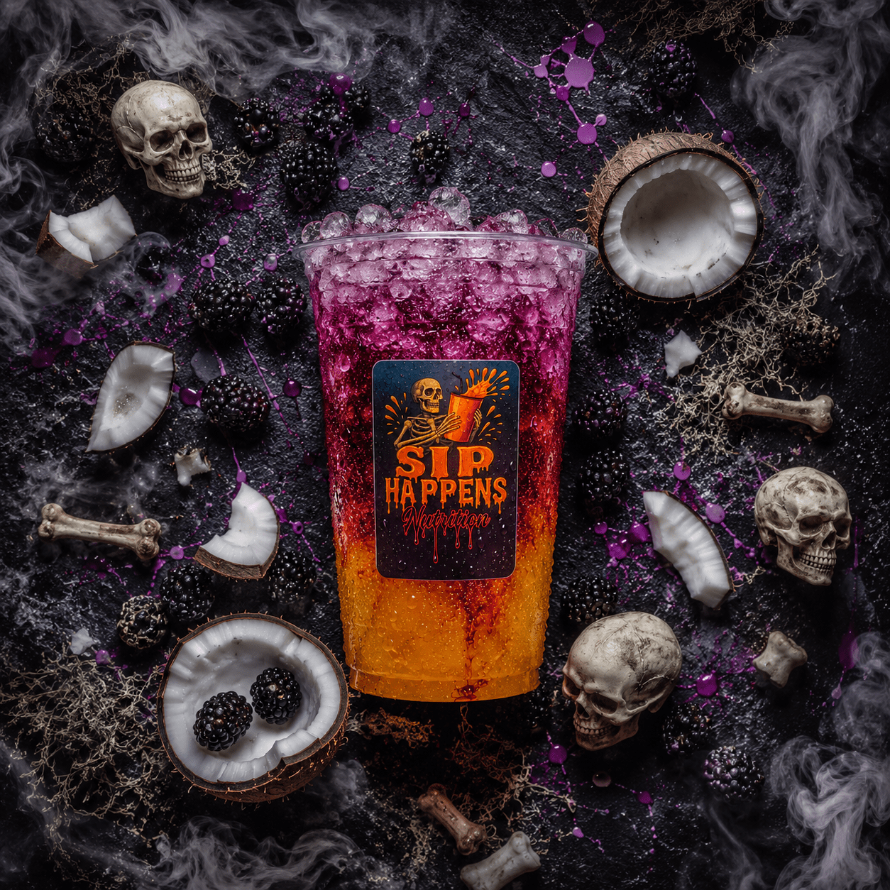 Sip Happens Nutrition Halloween-themed layered drink with blackberry and coconut, surrounded by skulls, bones, and dry ice smoke