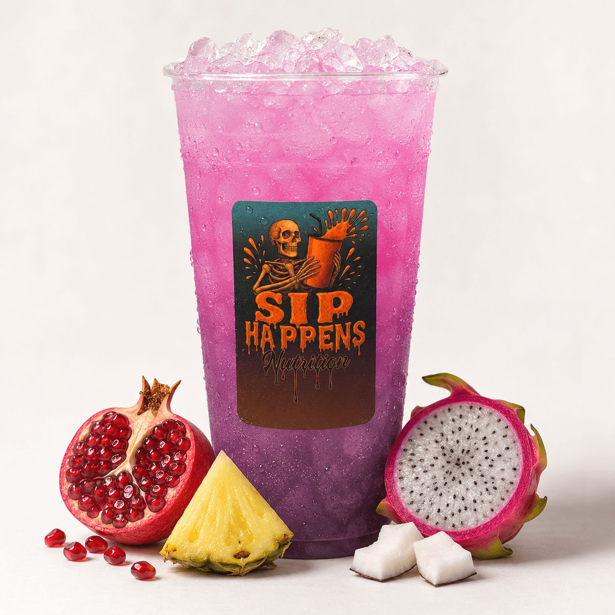 Sip Happens Nutrition iced drink with a pink-to-purple gradient, surrounded by pomegranate, pineapple, dragon fruit, and coconut