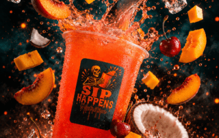 Sip Happens Nutrition orange drink cup with splashing liquid surrounded by peach slices, mango, cherries, coconut, and ice cubes